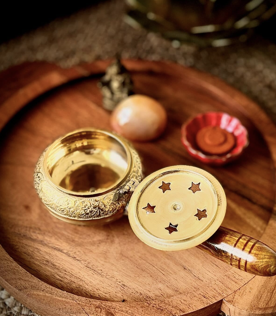 DAASI Dhumra incense burner, Engraved design, ornate floral-engraved brass body with wooden handle.