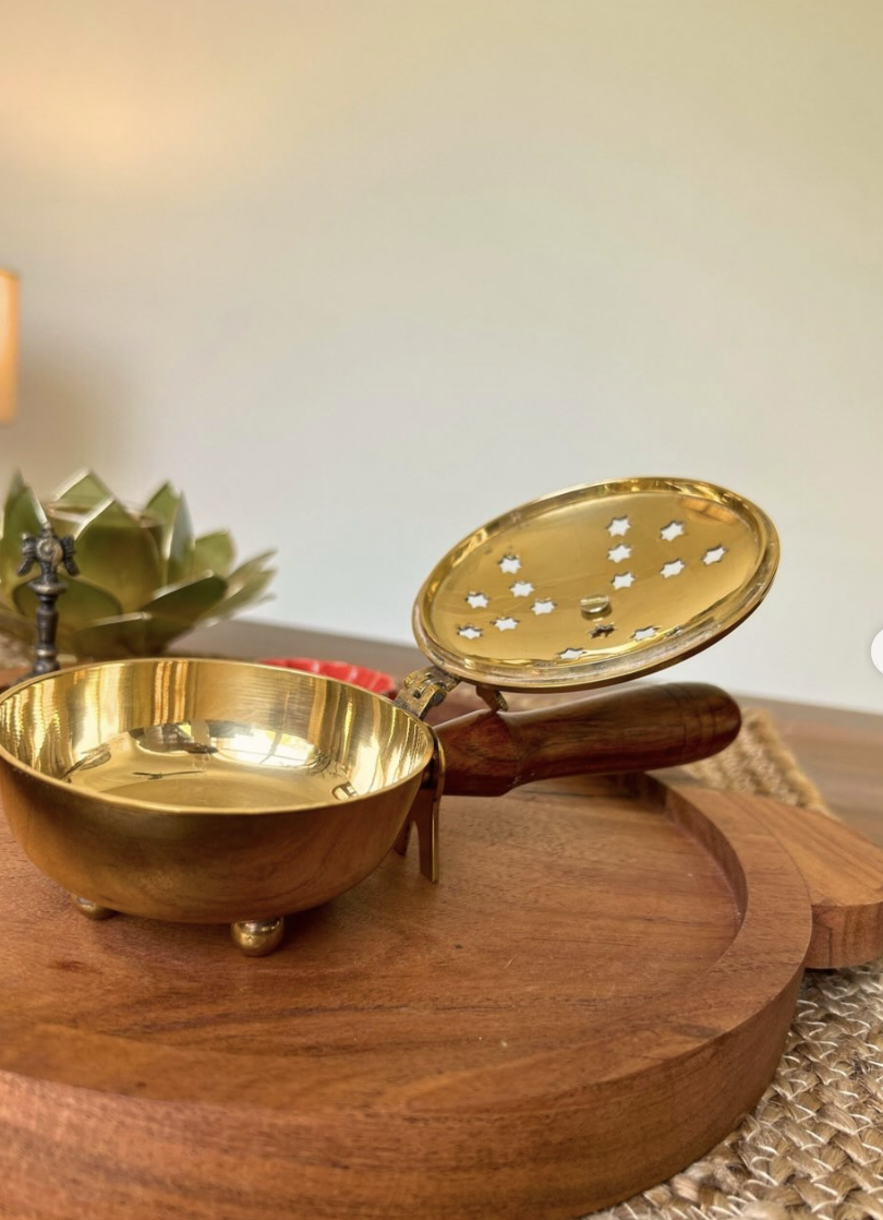 DAASI Dhumra incense burner, Plain design, lid open showing star-cutout pattern.